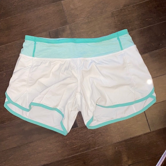 Lululemon speed short size 4 reg GUC white with sea green stripe. Original style